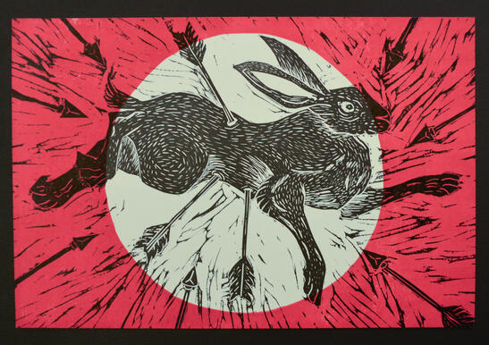 Hare in black in center with white circle behind it and red background. Ten black arrows coming towards the hare, and three puncture it.