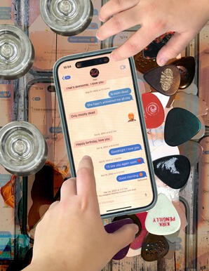 A phone is in center reading a text exchange between artist and dad. A hand touches the phone at the top and bottom. The phone is on a table collaged with spills and multitudes of the phones screen. There are guitar picks and shot glasses on the table.